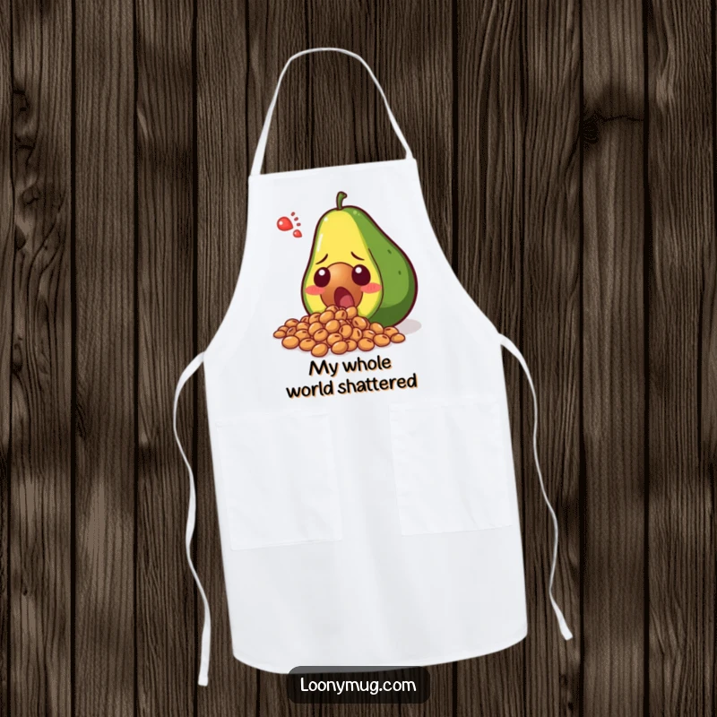 Funny shocked avocado spilling its seeds in disbelief, on a practical kitchen apron. A humorous and protective garment for cooks.