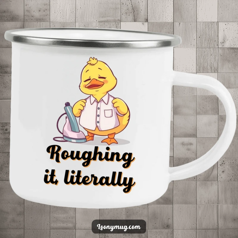 Funny Camping Mug showing a confused rubber duck trying to iron a tiny shirt, perfect for outdoor humor.