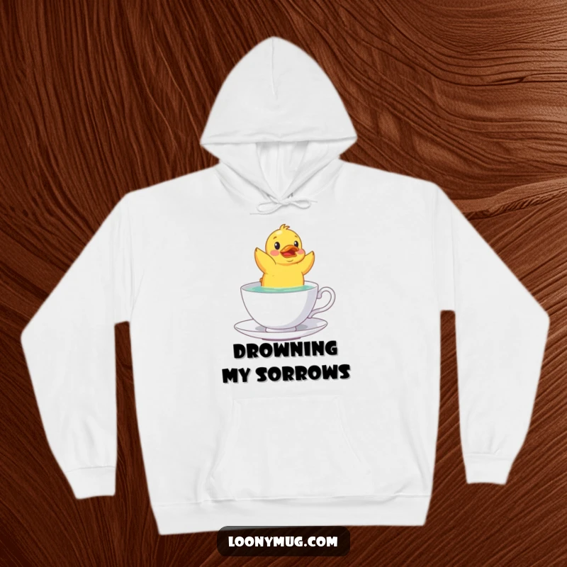 Funny rubber duck in a teacup design on a warm hoodie, perfect for those who enjoy whimsical apparel.