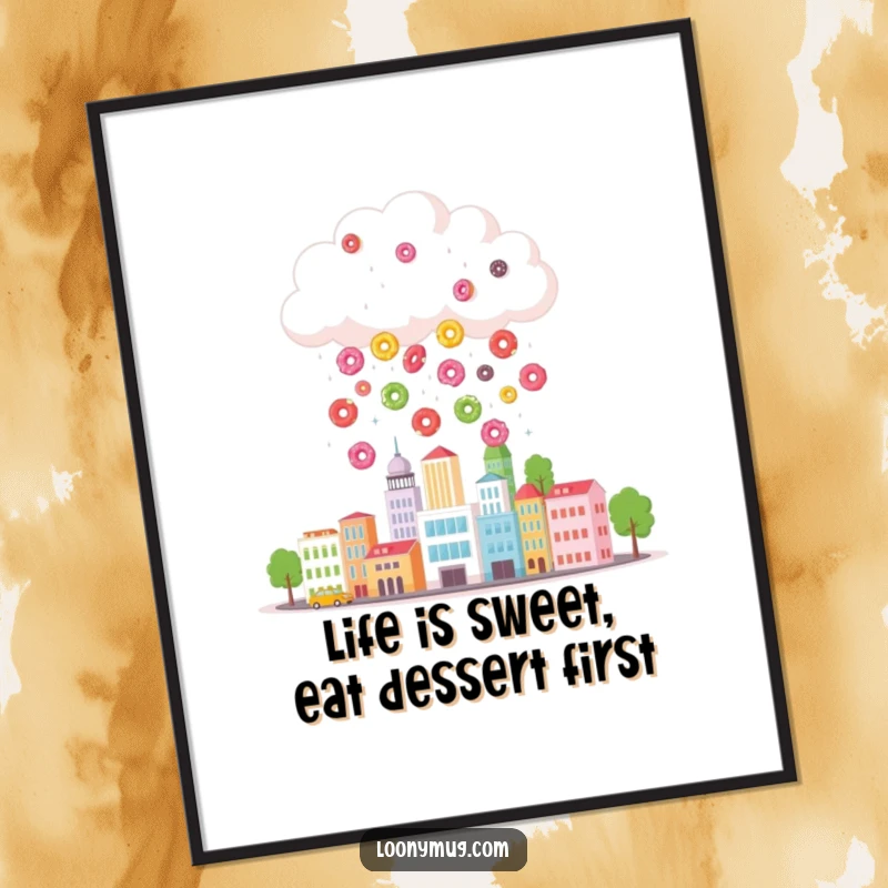 Funny free printable wall art: a fluffy cloud joyfully rains colorful donuts onto a tiny, charming cityscape below.