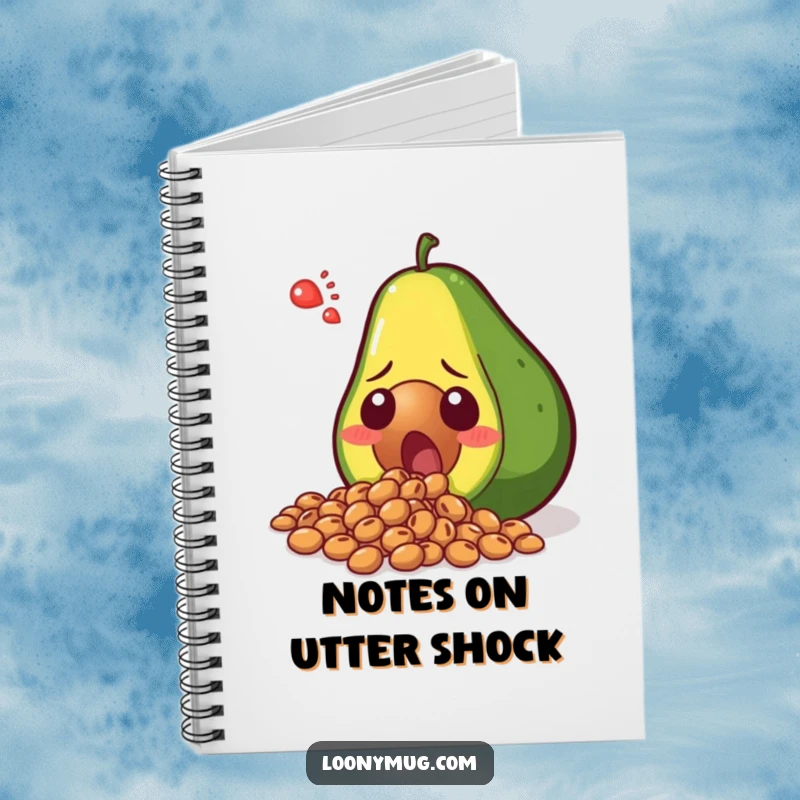 Funny shocked avocado spilling its seeds in disbelief, gracing the cover of a notebook. Perfect for writing and doodling with humor.