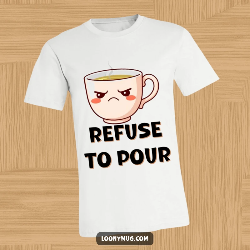 Funny t-shirt graphic of a grumpy teacup with a scowl, refusing tea, perfect for humor lovers.